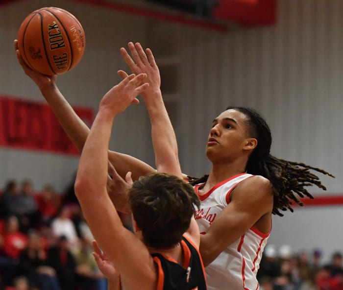 Holliday's Keitenn Bristow shoots during a home game against Nocona on Dec. 15.
